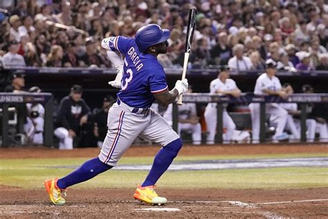 Rangers slugger Adolis García appears to hurt left side and leaves World Series Game 3